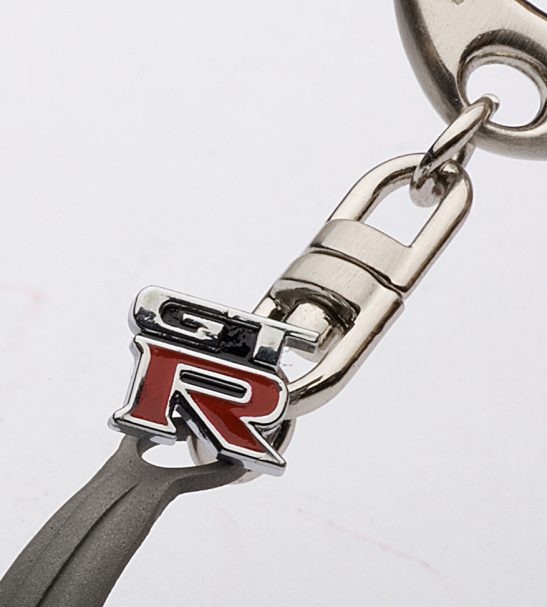 Nissan Skyline R34 GT-R Wheel Keychain with GT-R Emblem